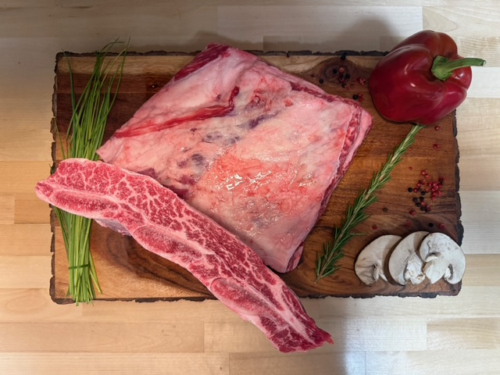 A plate of dino ribs otherwise known as short ribs