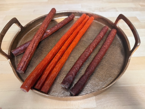A tray of assorted pepperonis