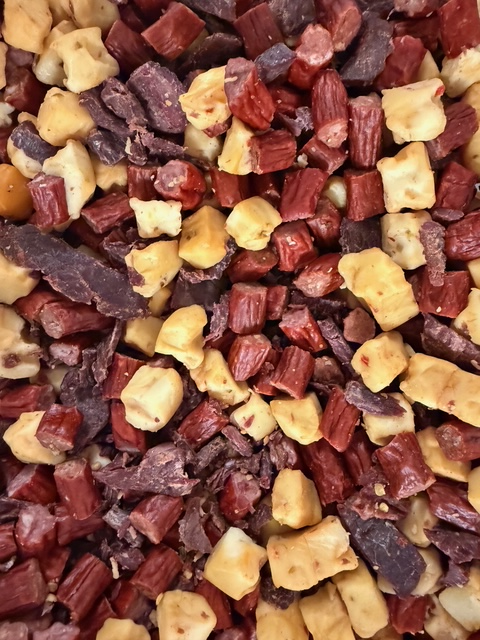 Assorted meat sticks and cheeses known as Spicy Trail mix