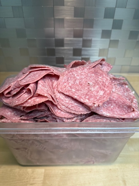 A bin full of genoa salami