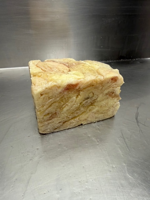 A one pound block of chicken skin
