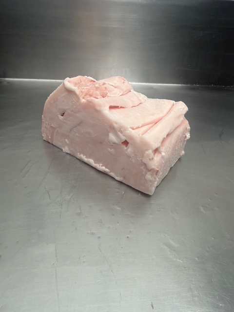a cube of pork back fat