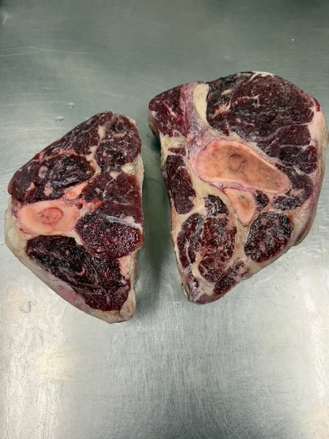 Two Frozen two inch thick beef shanks