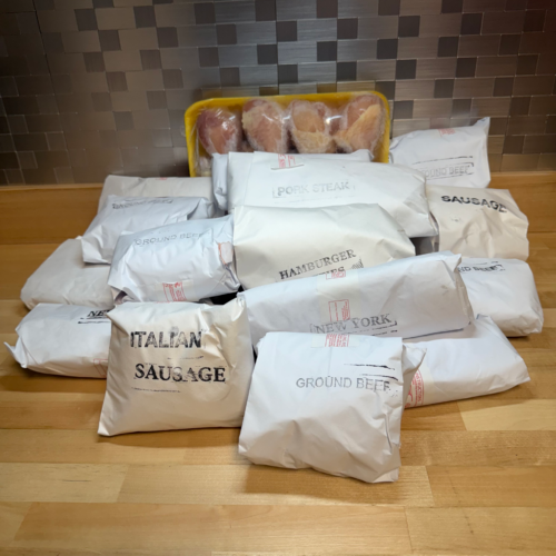 A pile of assorted wrapped meats